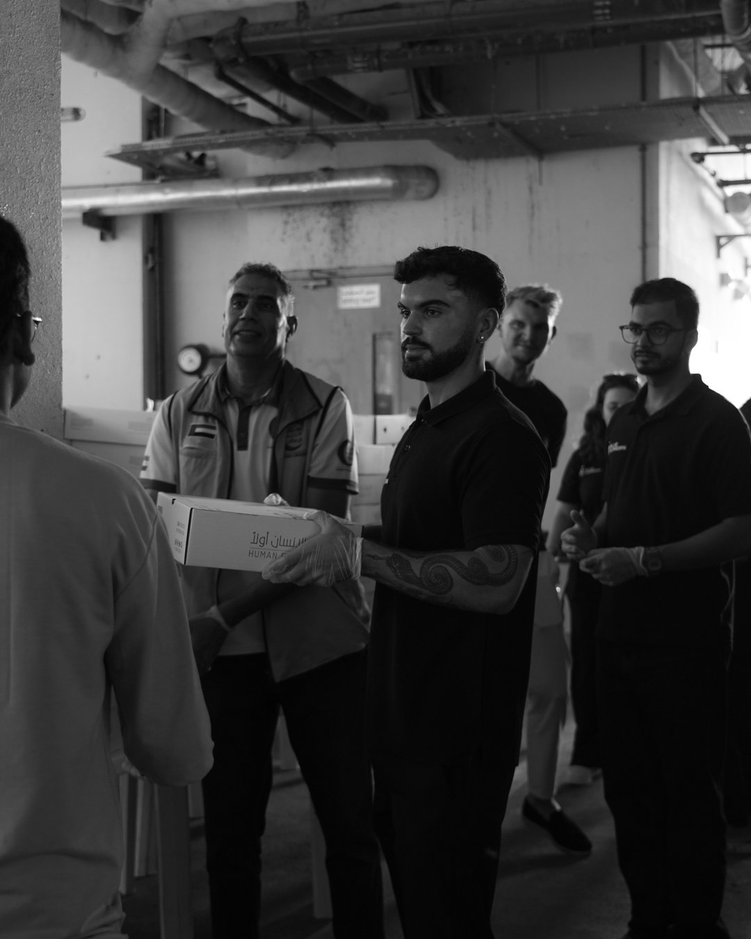 Blue Guardian CEO Sean Bainton and Team Share Ramadan Blessings with Workers at Sonapur Labour Camp